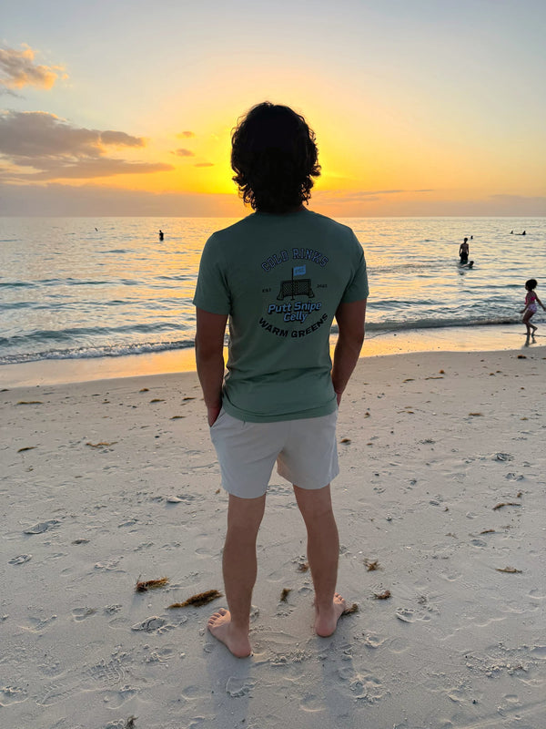 One of our customers, Connor, catching a view of the sunset in Mexico wearing the Heritage Tee in Heather Sage. What a beauty. 