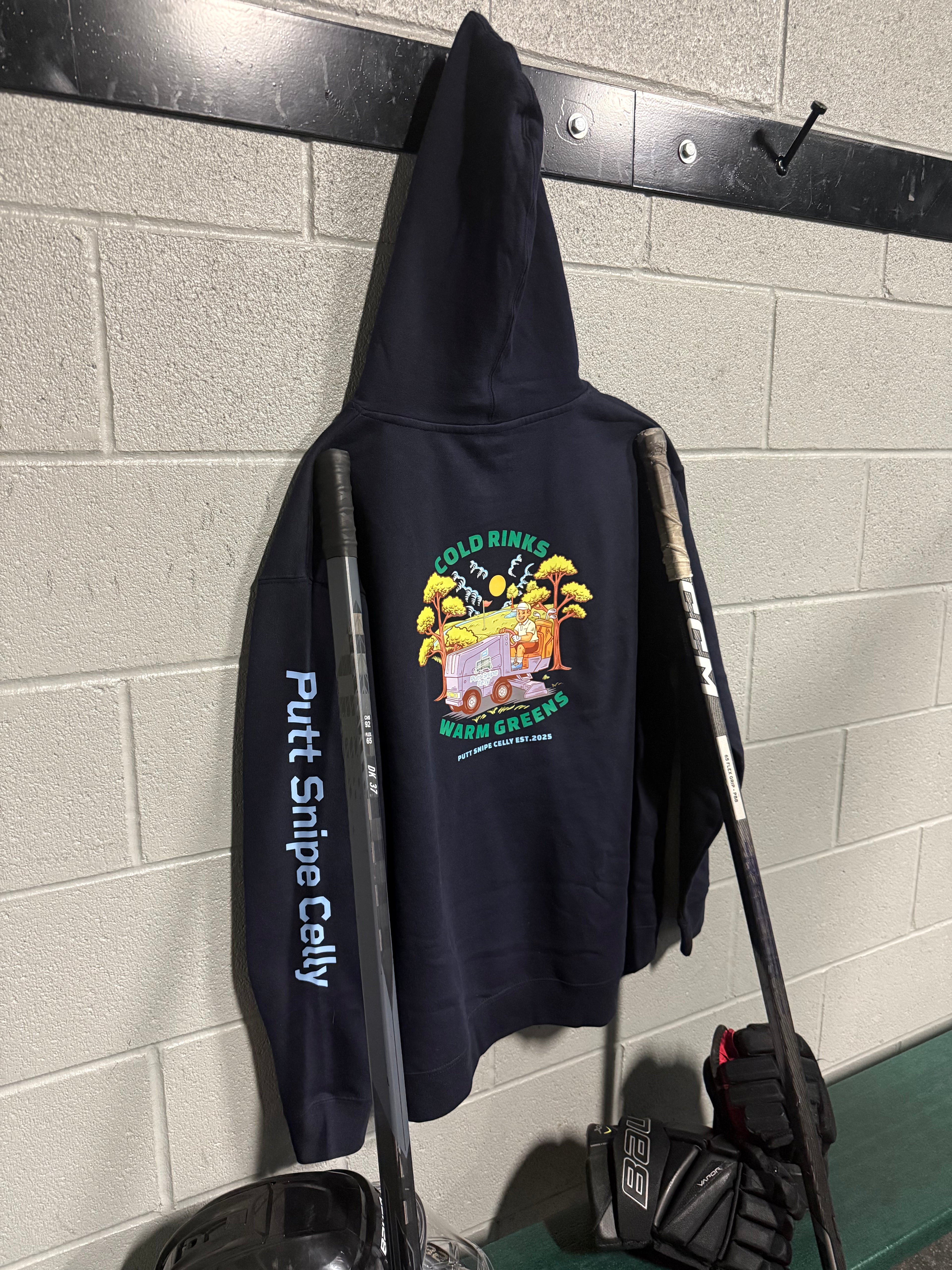 Locker Room setting featuring the Fresh Sheet design in the Classic Navy colored hoodie showing both the main back design and signature word mark on left sleeve from Putt Snipe Celly.