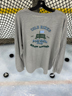 View of the back of the Heritage design in the athletic heather colored long sleeve lifestyle t-shirt shown hanging from a hockey net with pucks on the ice below. Presented by Putt Snipe Celly